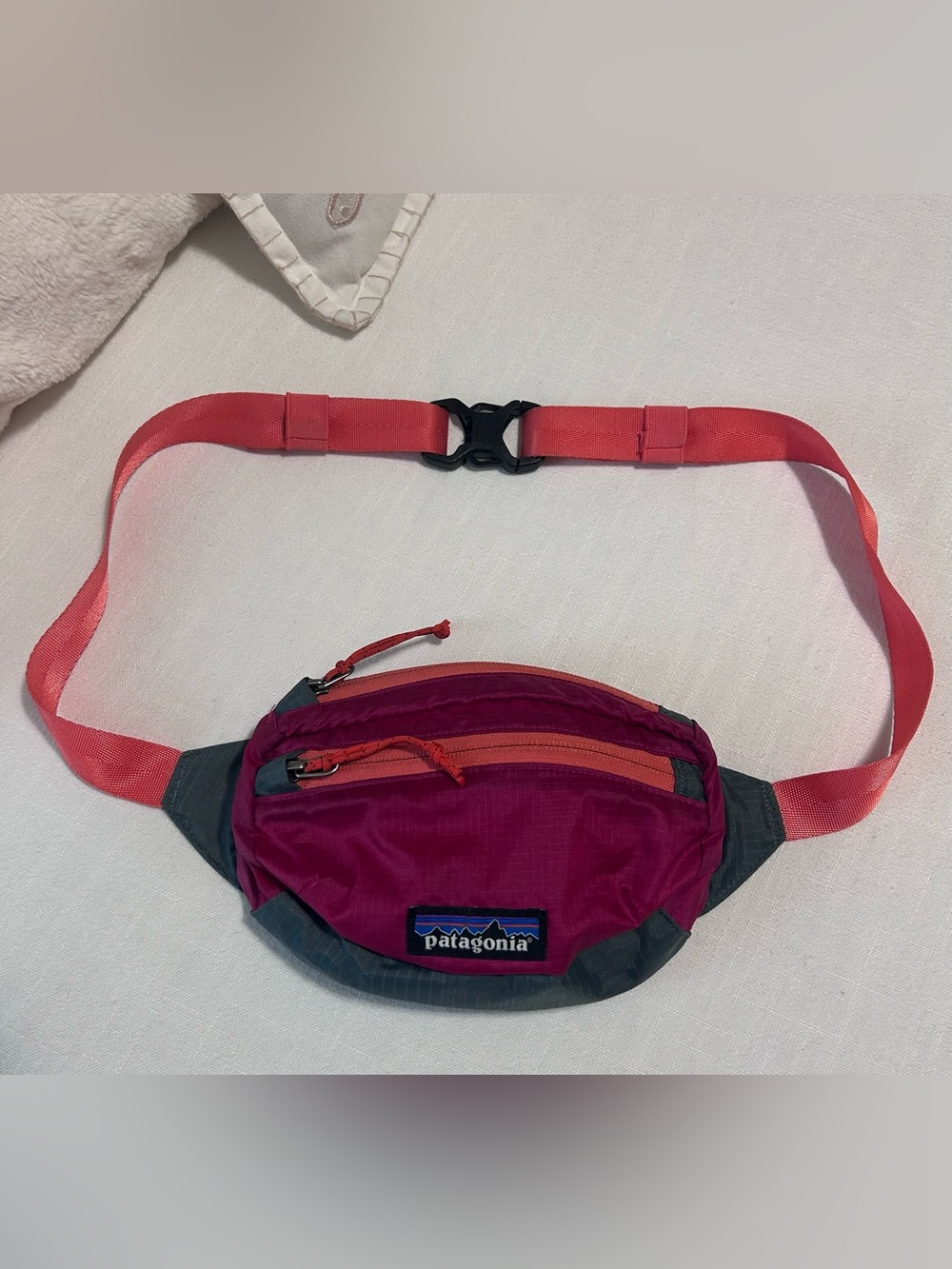 Patagonia lightweight Travel Mini with coral straps